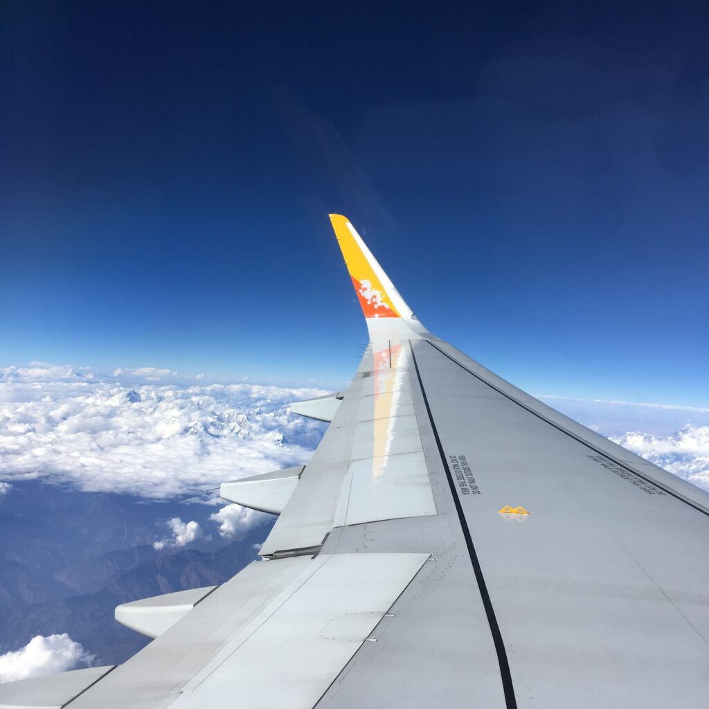 Bhutanese airline plane over the Himalayas